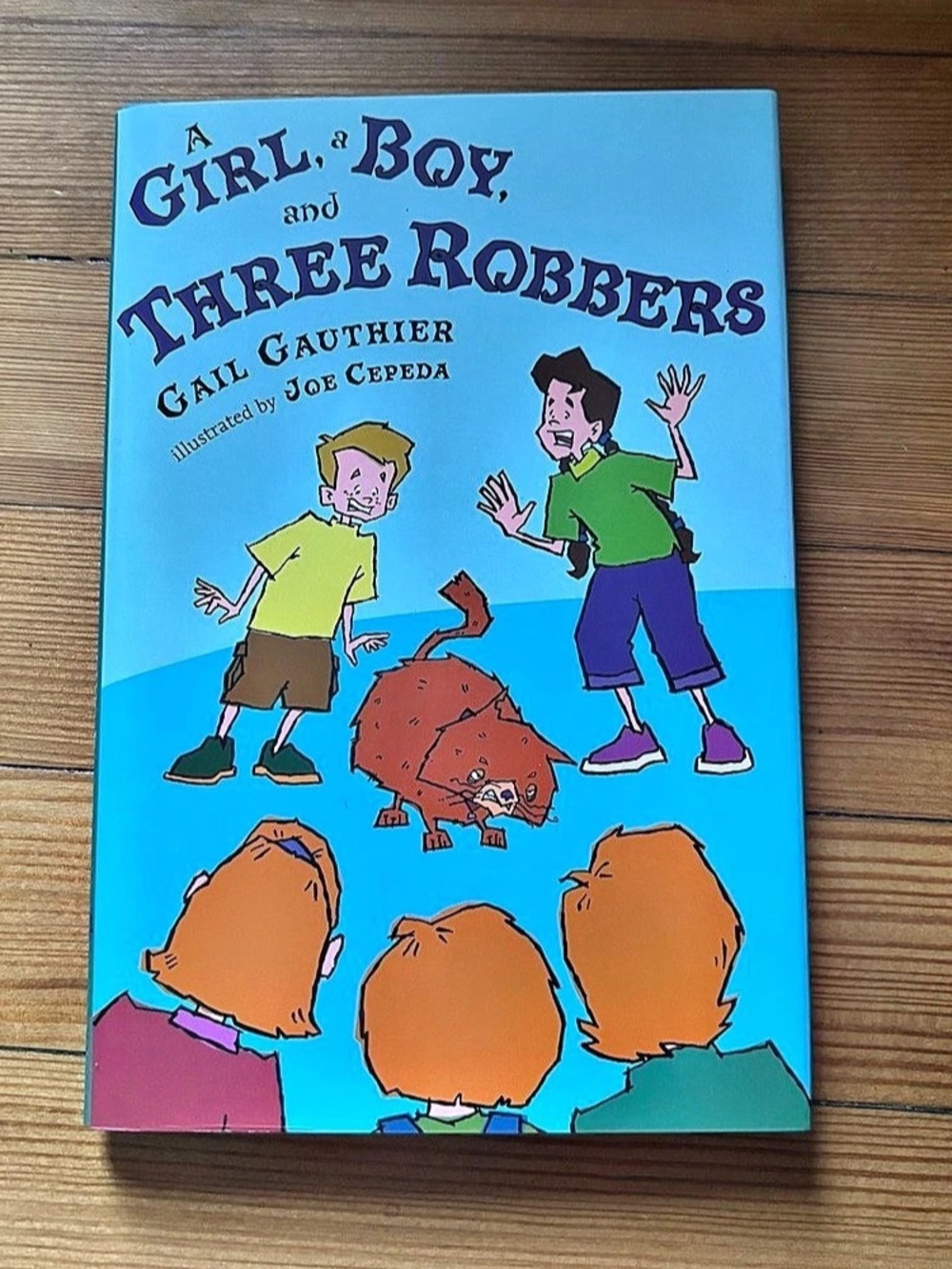 A Girl, A Boy, and Three Robbers Hardcover Book by Gail Gauthier